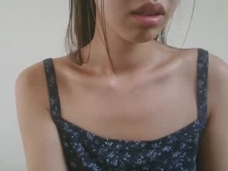 axuepetitt asian cam babe with small tits offer their holes for hot live sex